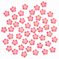 Pink sakura cherry blossom resin charms with white daisy centres - 20 piece pack